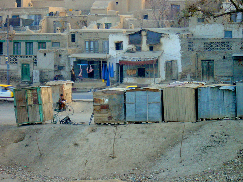 LAMB AND BURKAS HANGING IN KABUL